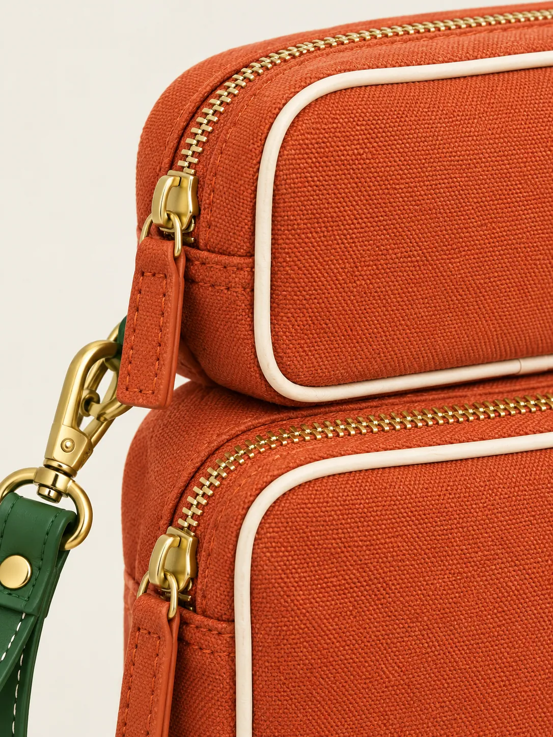 Double-Zip Box Wristlet, close-up of the two stacked zips and chalk piping