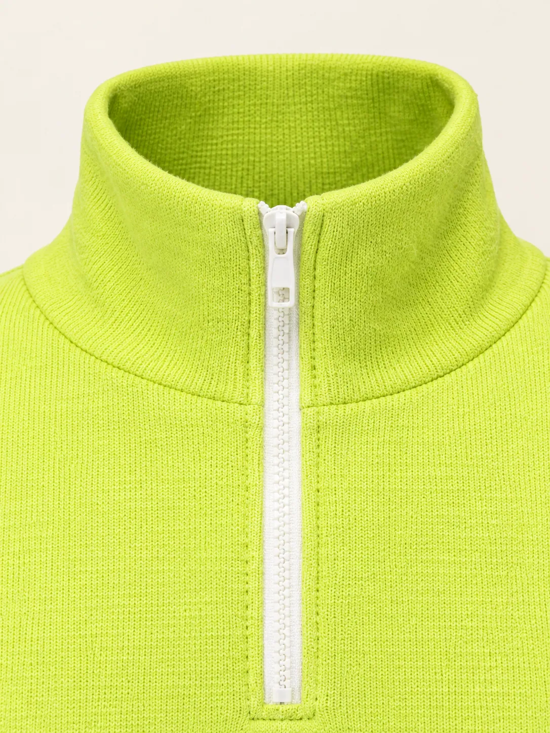 Half-Zip Funnel Pullover, close-up of the funnel neck and white zip tape