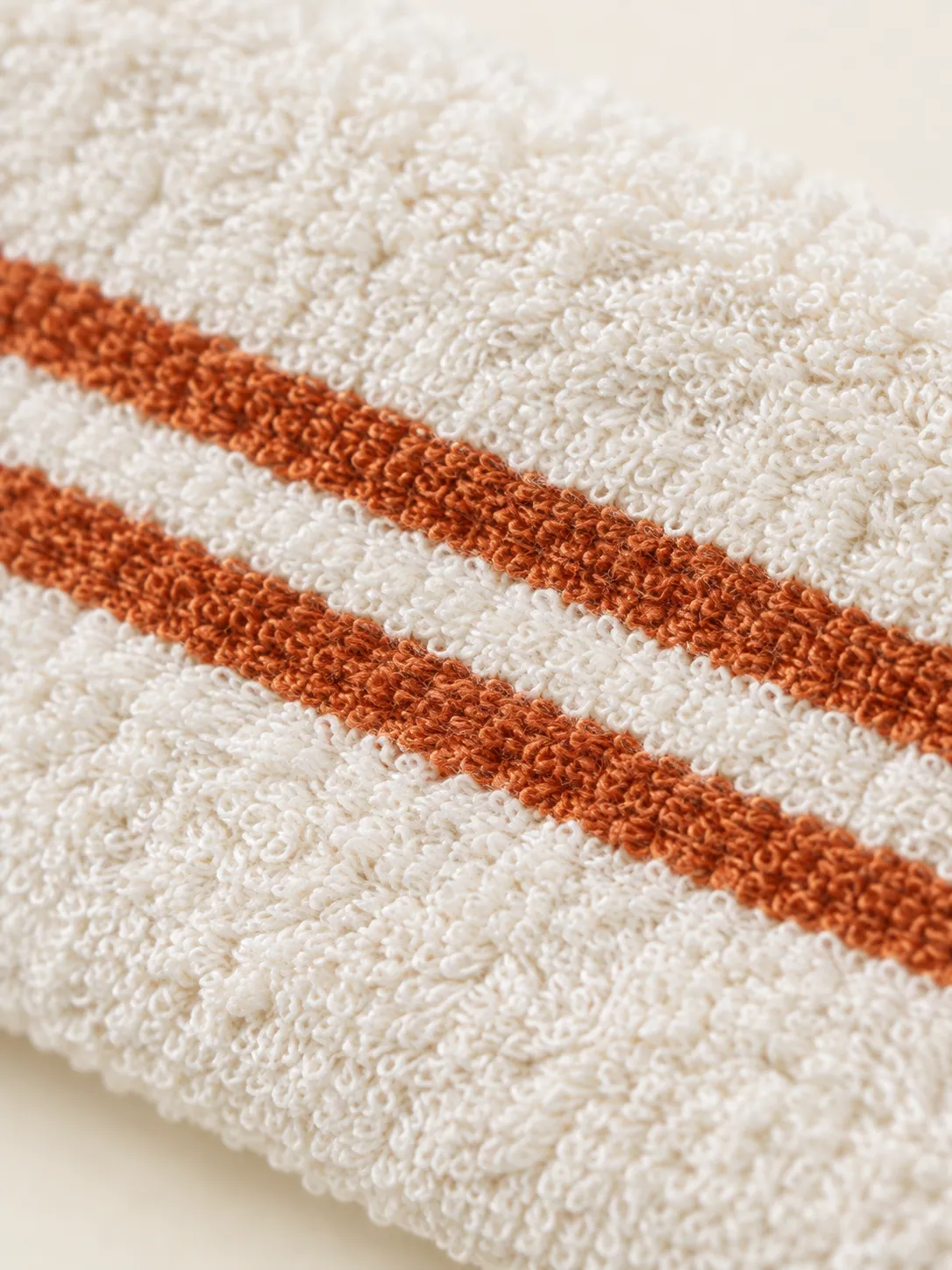 Headband & Wristband Set, close-up of the clay stripes on the terry