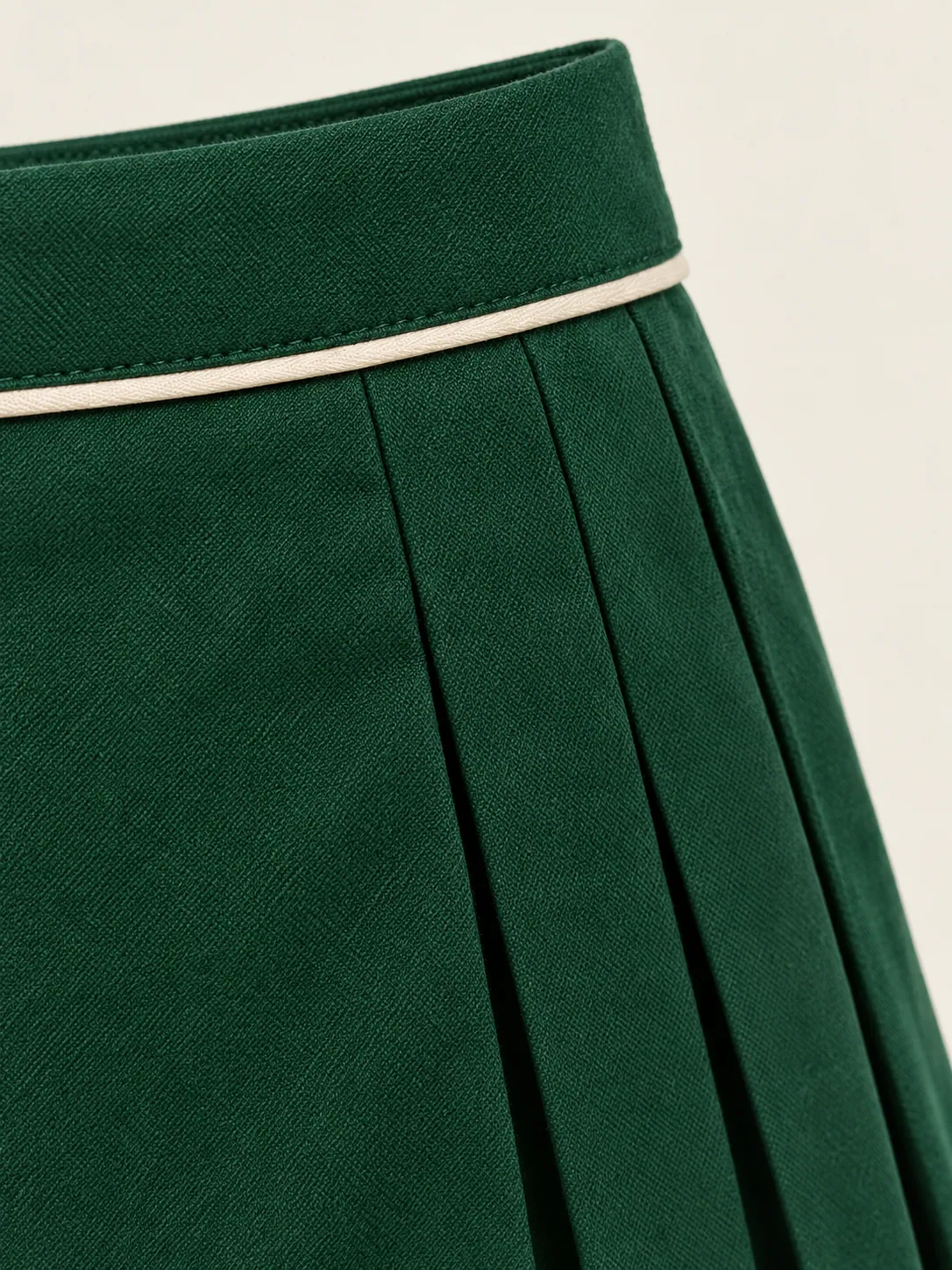 Side-Pleat Skort, close-up of the side pleat bank and chalk-piped waistband