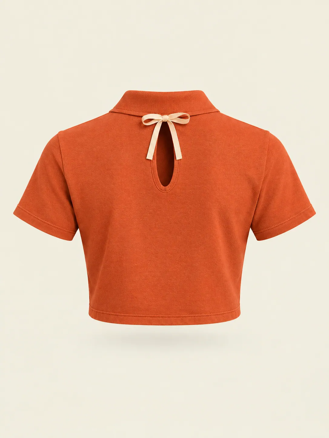 Sideline Open-Back Polo in Clay, back view