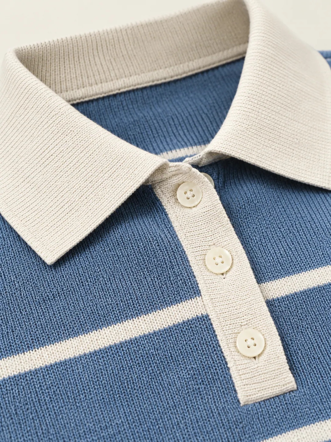 Tiebreak Striped Polo, close-up of the knitted stripes and white collar